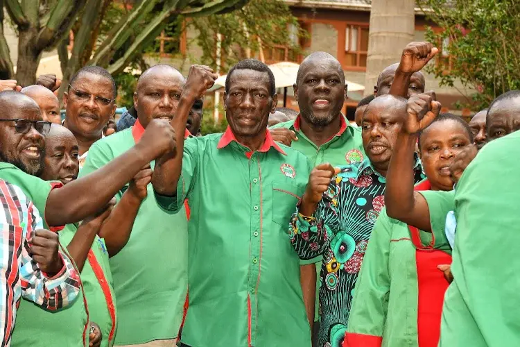 The Secretary-General of the Kenya National Union of Teachers (KNUT) is Collins Oyuu and other union officials during a previous stand off over salary increments (Image: Files)