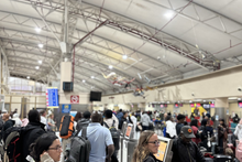 Frustrated travelers at JKIA after their flights were delayed for  hours (Image: UGC)