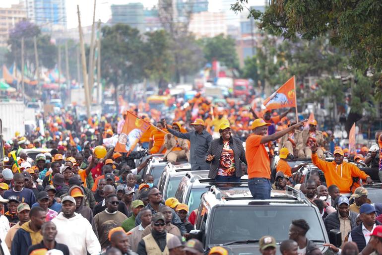 ODM politicians and government officials interacting with party supporters as they made their way to Jacaranda Grounds.