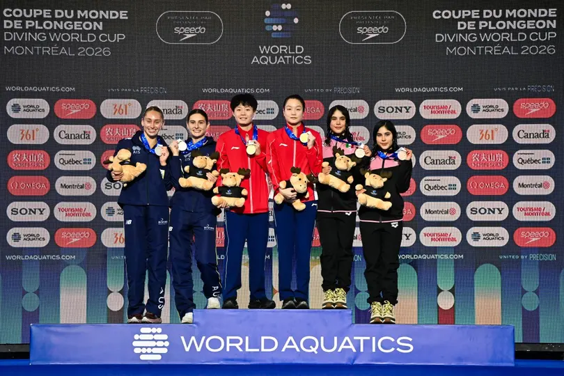 Mia y Lia Cueva en el podio en la Copa Mundial de Clavados en Montreal 2026 | AFP