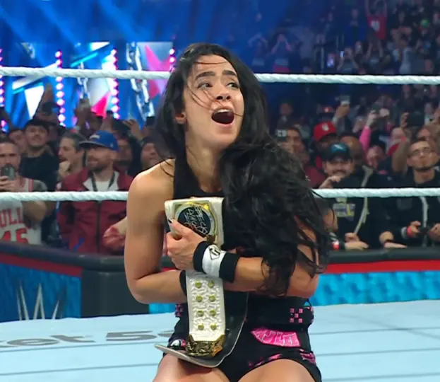 AJ Lee ganando el campeonato IC femenino | Captura de pantalla de WWE