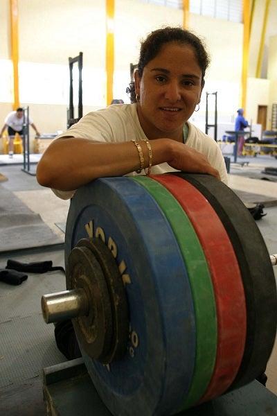 Jiménez posa en un entrenamiento un par de años después de conquistar la presea áurea | RÉCORD
