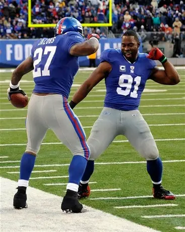 Jacobs y Bradshaw arrollan a Washington; Gigantes doblega 31-7 a Pieles Rojas