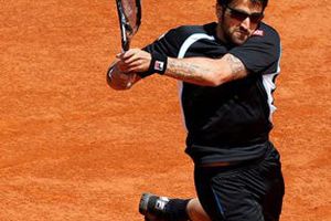 Federer vence a Tipsarevic y alcanza los octavos de final