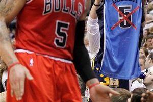 Chicago  derrota a Utah 91-87; Boozer regresa a Salt Lake City