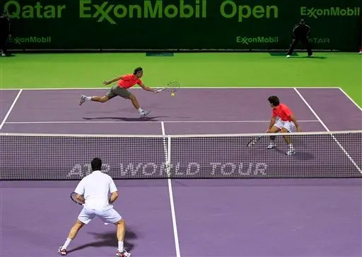 Nadal y López ganan en dobles en Doha