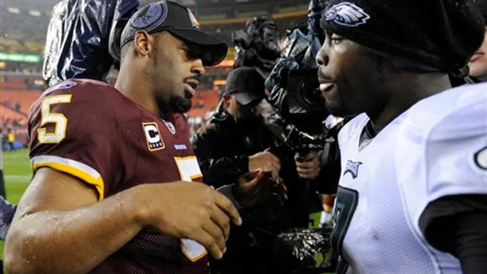 Vick hace historia en la NFL; Filadelfia masacra 59-28 a Washington