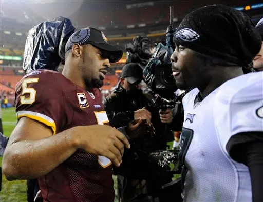 Vick hace historia en la NFL; Filadelfia masacra 59-28 a Washington
