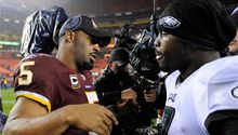 Vick hace historia en la NFL; Filadelfia masacra 59-28 a Washington