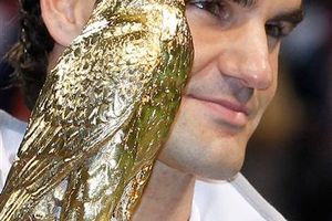 Federer vence a Davydenko y se corona en Abierto de Qatar