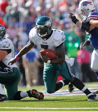 Vick impone récord de yardas corridas para un quarterback