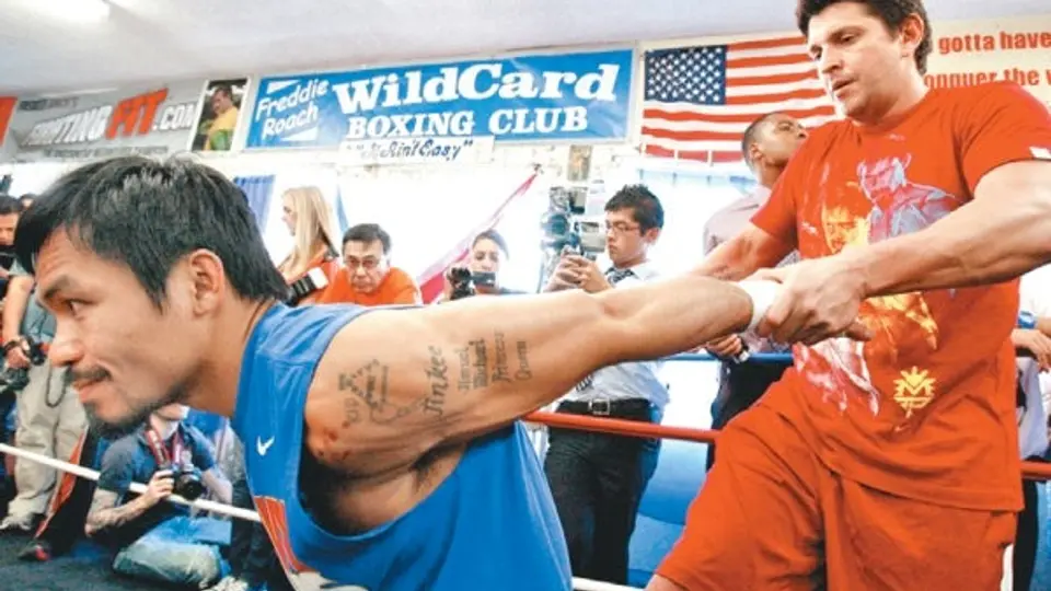 Preparador físico de Pacquiao, 'descontento' con el trabajo del filipino