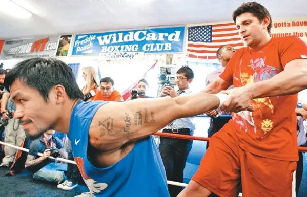 Preparador físico de Pacquiao, 'descontento' con el trabajo del filipino