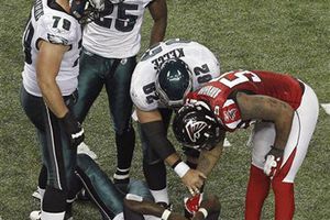 Vick en duda luego de conmoción cerebral