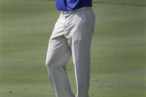 Woods se aleja en Bridgestone tras otro mal día