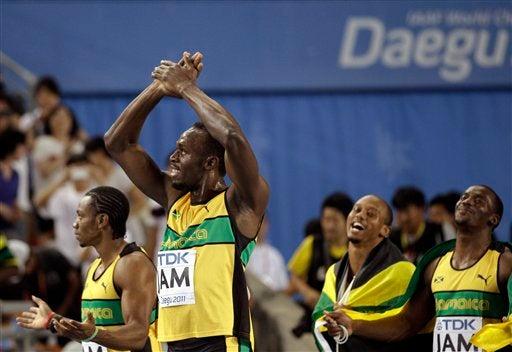 Usain Bolt y Jamaica cerraron el Mundial de atletismo con broche de oro al batir la plusmarca del relevo 4x100. FOTO: AP