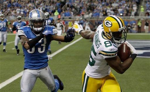 Greg Jennings escapa de Brandon McDonald. FOTO: AP
