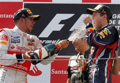 Gran duelo entre el alemán de Red Bull y Lewis Hamilton. (FOTO: AP)