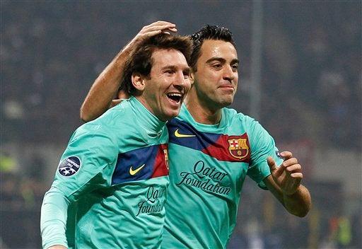 Messi y Xabi Hernández autores de los tantos del Barça al 31' y 63' respectivamente.. FOTO: AP