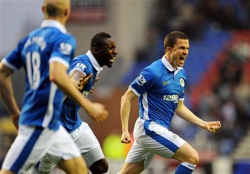 Wigan y Blackburn empatana tres goles. FOTO: AP