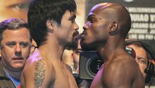 Pacquiao y Bradley libran la báscula