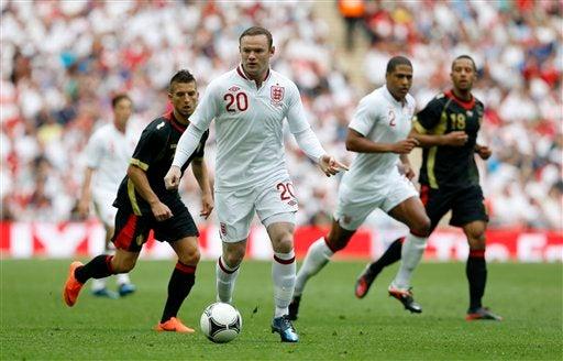 Rooney participó el el encuentro ante Bélgica l AP