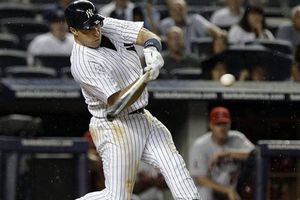 Yanquis ganan con dos jonrones de Teixeira