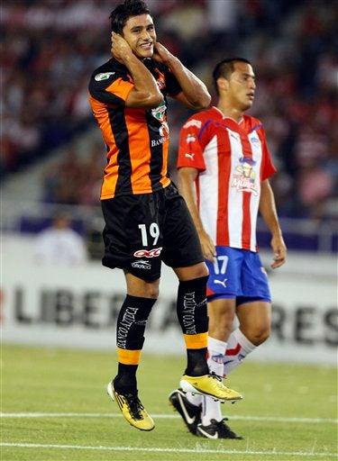Andrade reacciona  (FOTO: AP)