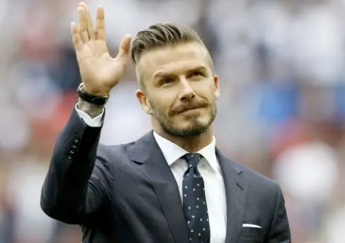 David Beckham portó antorcha olímpica en recorrido por el Támesis