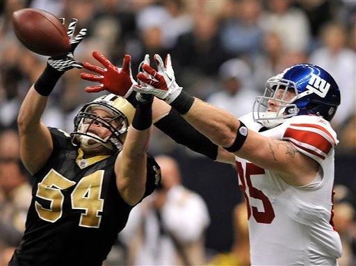 Will Herring y Jake Ballard buscan el ovoide. FOTO. AP