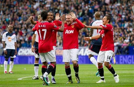 Rooney marcó tres tantos. FOTO: AP
