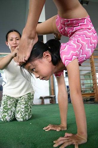 China comienza a entrenar a su deportistas a temprana edad | DAYLI MAIL