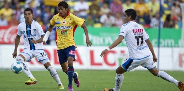 Joao Rojas y Raúl Rico al primer tiempo. FOTO: MEXSPORT