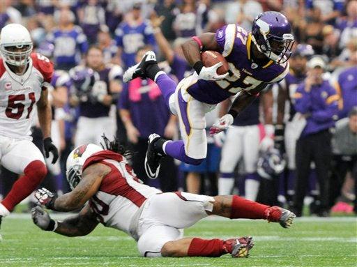 Lorenzo Booker de Minnesota en la segunda mitad. FOTO: AP