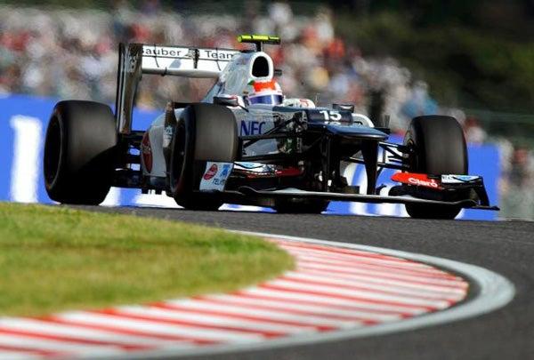 Sergio Pérez durante la carrera de Gran Premio de Japón | EFE