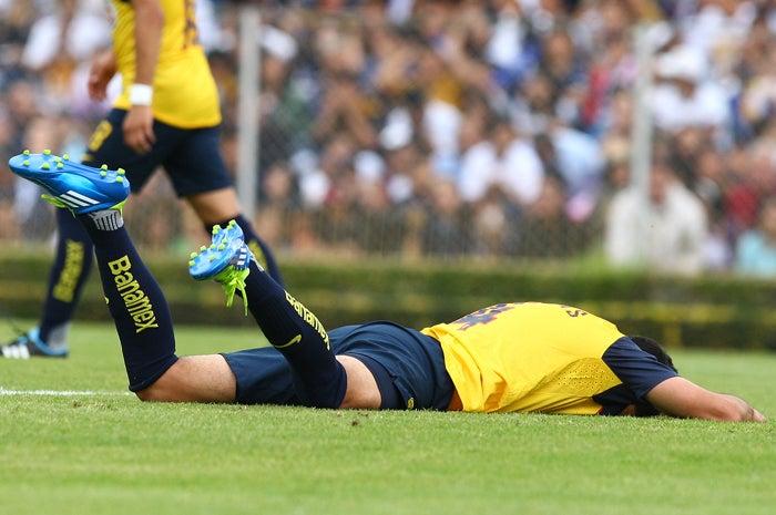 América llora la derrota. FOTO: ESTEBAN LÓPEZ
