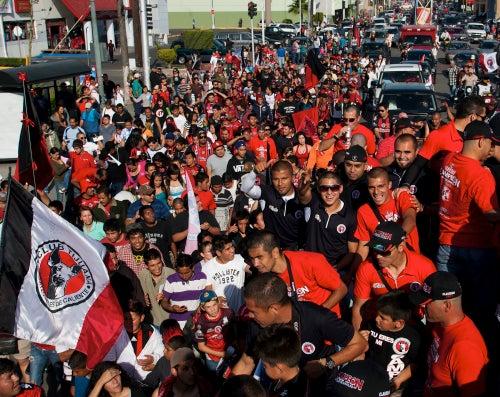 Xolos realizan desfile triunfal