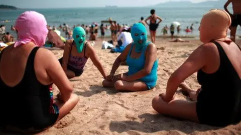 Impone China moda en playas