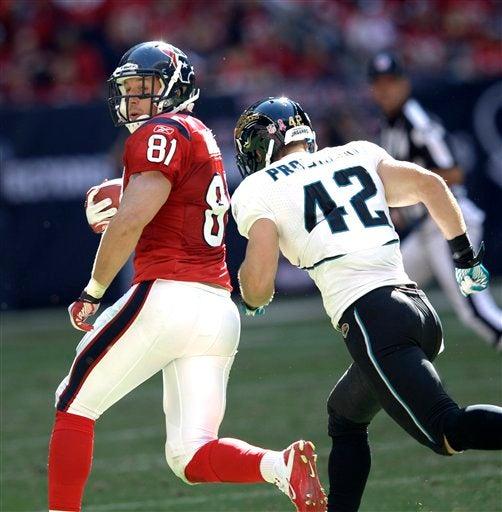 Owen Daniels y Chris Prosinski. FOTO: AP