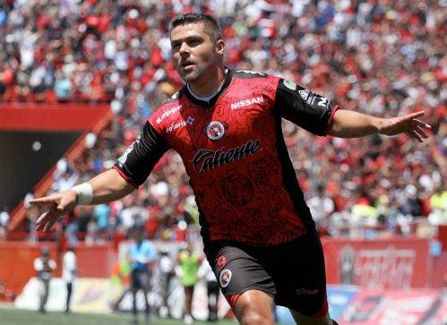 La fiesta fue para Tijuana, que festejó el boleto al máximo circuito (FOTO: MEXSPORT)