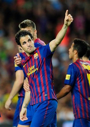 Cesc celebra su primer gol con el Barcelona. FOTO: AP