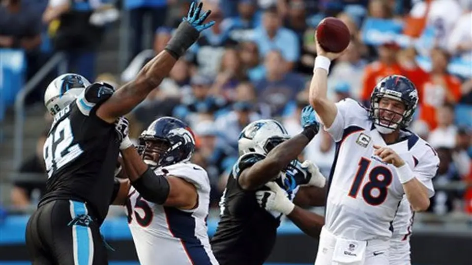 Peyton le da una cátedra a Cam Newton