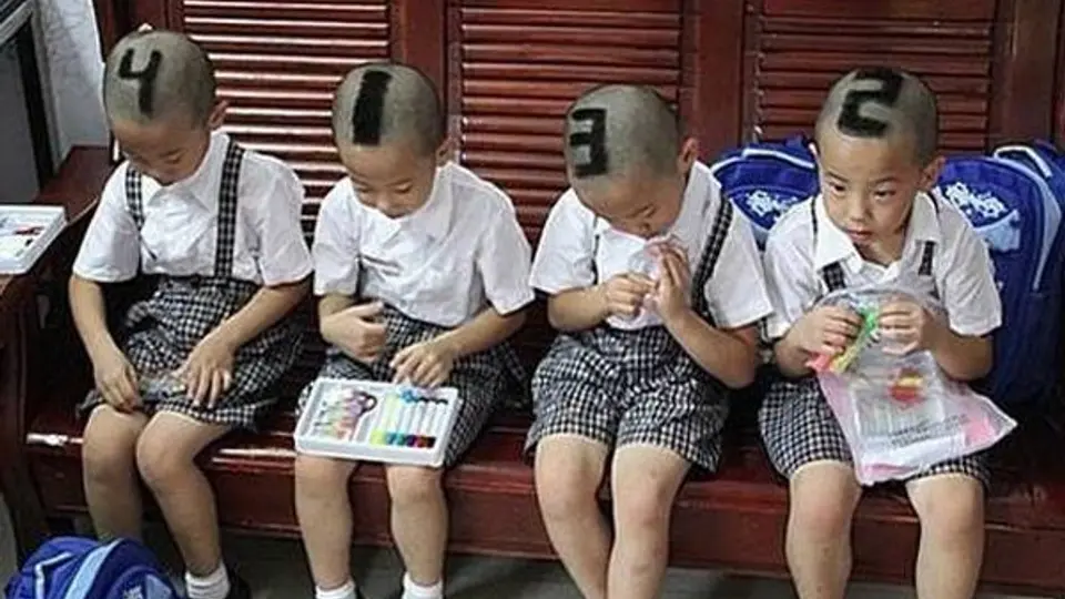 Madre china enumera a sus hijos con un corte de cabello