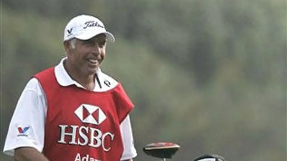 Woods señala que su ex caddie no es racista