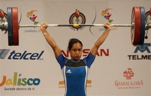 El oro fue para dominicana Yuderquis Contreras, quien cargó 206 kilos. FOTO: AP