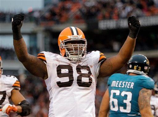 Phillip Taylor celebra mientras Cafés se mantenían en ventaja. FOTO: AP