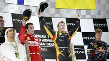 Raikkonen se impone en Yas Marina y Vettel se cuela al podio