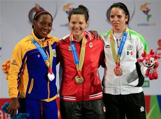 Christine Girard rompió el récord continental. FOTO: AP