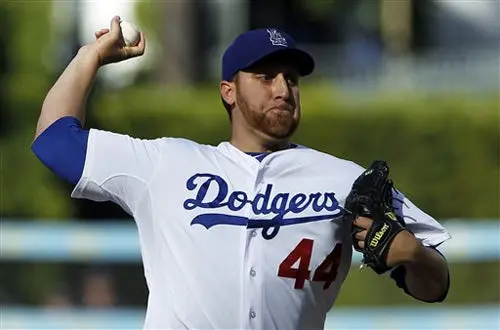 Consigue Aarón Harang victoria 100