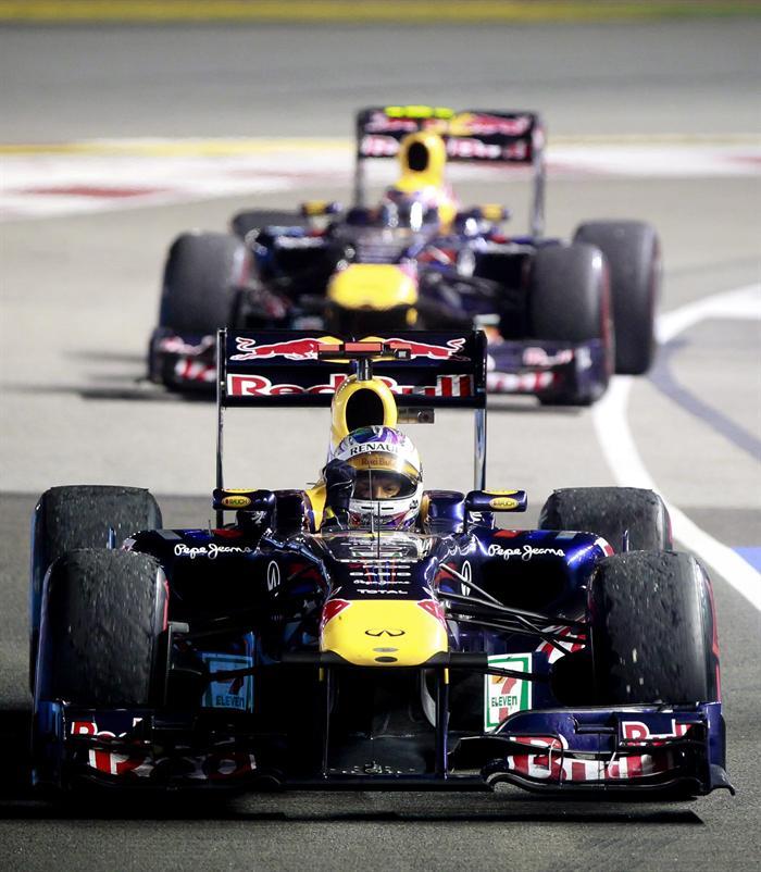 Jenson Button se aproximó al alemán y puso en peligro su triunfo por cinco vueltas. FOTO: EFE